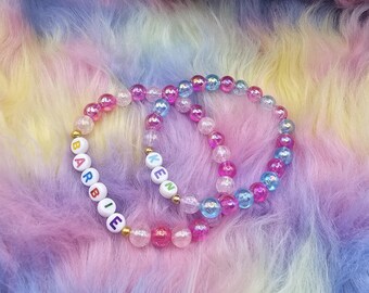 Pulsera de Barbie y Ken