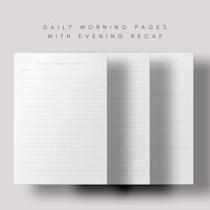 May include: A blank, lined notebook with the text "My Daily Morning Pages" and "Recap" printed on the top of each page. The notebook is open to show both pages.