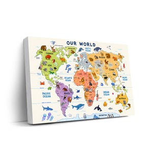 May include: A rectangular wall art canvas titled OUR WORLD featuring a colorful world map with illustrations of various animals placed across different continents and oceans, including blue water, green, orange, and purple landmasses.