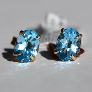 14K Gold Blue Topaz Oval Cut 1.93 Carat Stud Earrings