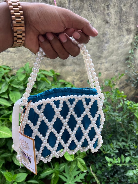 Handmade beaded top handle bags