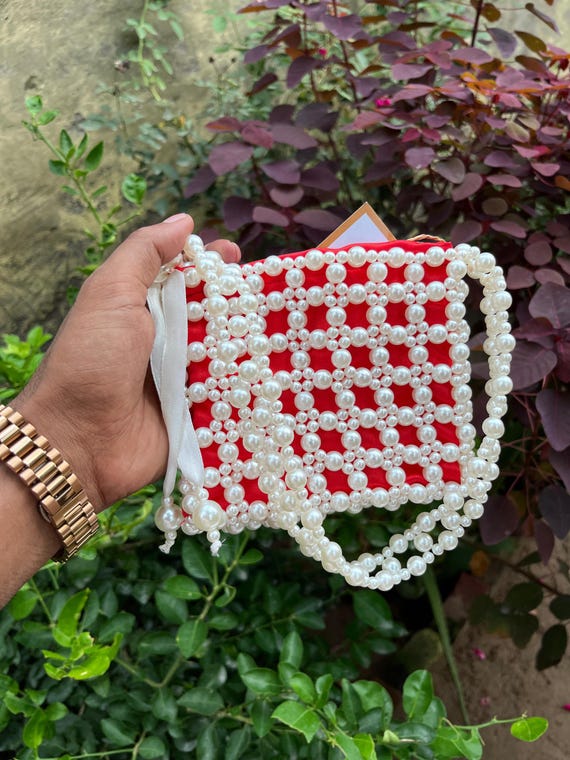 Handmade beaded hand bags