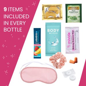 May include: Nine items included in every bottle: a pink eye mask, a pink hair scrunchie, a packet of body wipes, a packet of makeup remover wipes, a packet of gold collagen eye masks, a packet of tea, a packet of electrolyte drink mix, a pair of earplugs, and two white round tablets.