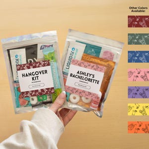 May include: Two clear, zippered pouches labeled "Hangover Kit" and "Ashley's Bachelorette Hangover Kit." Each kit contains various essentials, including mouthwash, candy, and other small items. The kits are held against a light-colored background, with color swatches on the right.