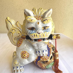 VTG Kutani Foo Dog, Komainu, Chinese or Imperial Guardian Lion on Ornate Decorated Ball Gold Hand Painted Accents Tassel 6.5” Tall x 4.5” W