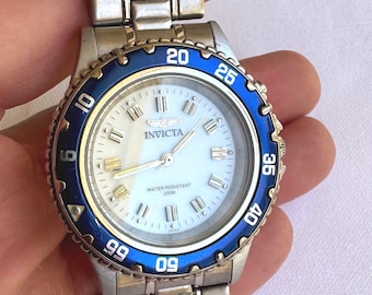 Invicta Men's Silver Wrist Watch, Blue Bezel, Water Resistant 200M