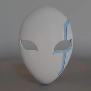 May include: White mask with oval shape and eye cutouts. Light blue accents are on the right side. The mask is smooth and appears to be made of a solid material. The mask is likely for costume or decorative purposes.