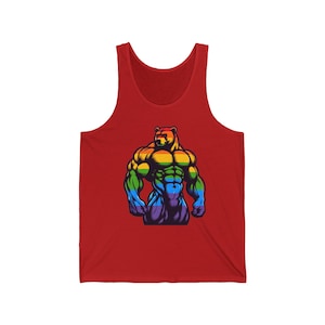 May include: Red tank top featuring a rainbow coloured muscular bear graphic.