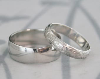 Platina trouwringset Ringen voor hem en haar Massief platina trouwringset neoklassieke bloemenring en effen 7 mm brede bandset voor stel
