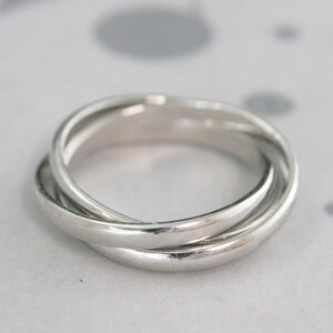 Anillo giratorio de platino de 3 bandas, platino macizo, bandas de 2 mm de ancho, anillo antiestrés, anillo de boda, 3 bandas entrelazadas, anillo de aniversario. imagen 2