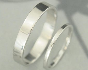 Platina trouwringen Platina trouwringset voor hem en haar Platina ringen platte randbanden 4 mm brede platina ring plat profiel