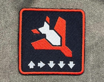Adelaar 500 kg bom op Helldivers geïnspireerde patch - 8 x 8 cm / 3,1 x 3,1 inch geborduurd tactisch embleem, opstrijkbaar of klittenband, cadeau voor gamer