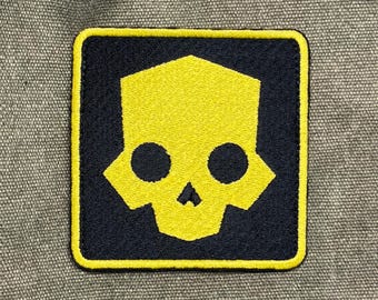 Op Helldivers geïnspireerde schedelpatch - 8 x 8 cm / 3,1 x 3,1 inch geborduurd tactisch embleem, opstrijkbaar of klittenband, uniformrugzak gamer cadeau