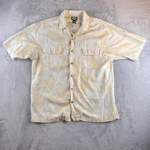 Camisa vintage Tommy Bahama para hombre, talla M, con estampado floral tropical, color crema y amarillo. LEER imagen 1