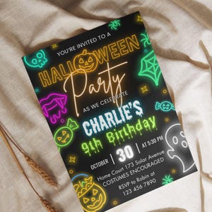 May include: A Halloween party invitation with a black background and neon-style graphics. The text reads "Halloween Party" and "Charlie's 9th Birthday" with the date and time. The invitation includes a ghost, spider, and pumpkin.