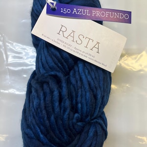 May include: A skein of deep blue super bulky yarn called "Rasta" in the color "Azul Profundo" (150). The yarn is made of 100% merino wool and is approximately 90 yards (82 meters) long. It is recommended for knitting needles US 13-19 or 9-15 mm.