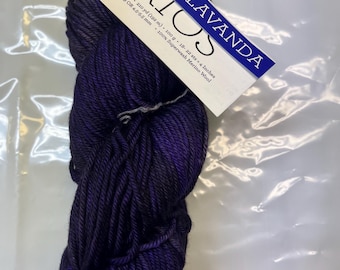 May include: A skein of deep purple yarn labeled "RIOS 066 LAVANDA" with the details: "WORSTED - 210 yd (192 m) - 100g - 18 - 22 sts - 4 Inches - NS: US 7-9 OR 4.5-5.5 mm - 100% Superwash Merino Wool"