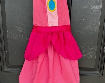 Avental infantil com fantasia da Princesa Peach