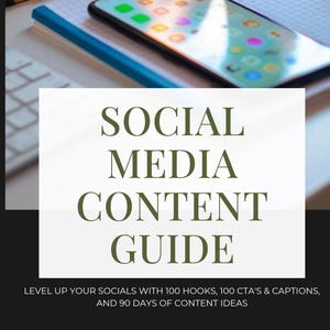 May include: A smartphone rests on a notebook with a blue spine, next to a keyboard. A white rectangle displays the text "SOCIAL MEDIA CONTENT GUIDE." Below, the text reads "LEVEL UP YOUR SOCIALS WITH 100 HOOKS, 100 CTA'S & CAPTIONS, AND 90 DAYS OF CONTENT IDEAS."