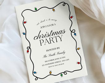 May include: Cream-colored Christmas party invitation with black text and a string of colorful lights as a border. The invitation reads "eat, drink & be merry, join us for a Christmas Party, hosted by The Smith Family."