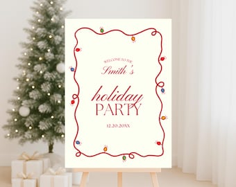 May include: A cream-colored sign on a wooden easel with the words "Smith's holiday PARTY" in burgundy script. The sign is framed by a red string of lights with colorful bulbs. A Christmas tree and wrapped gifts are in the background.