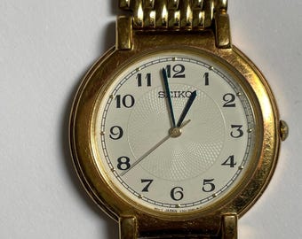 Seiko Stainless Steel Gold Tone Watch V701-1761