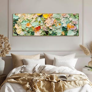 May include: Abstract painting with a textured, impasto style. The painting features a variety of colors, including green, yellow, orange, pink, and white. The painting is framed in a gold frame.