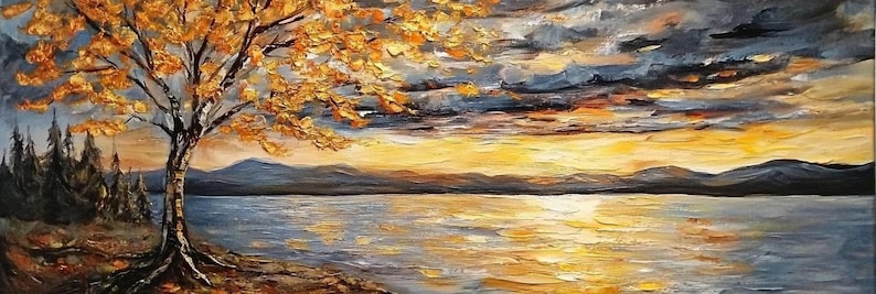 May include: A painting of a lake scene with a golden tree in the foreground. The sky is a mix of dark blue and orange, with a golden sunset reflecting on the water.