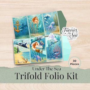 May include: A trifold folio kit with an "Under The Sea" theme, featuring watercolour illustrations of marine life. The kit includes 30 pieces and is decorated with images of mermaids, sharks, and other sea creatures. The kit is labelled "Forever by Sea".