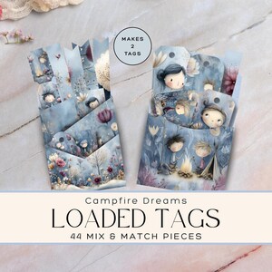 May include: Two stacks of Campfire Dreams loaded tags with 44 mix & match pieces. The tags feature illustrations of children around a campfire, with a soft blue and floral background. The text on the image reads "MAKES 2 TAGS" and "LOADED TAGS".