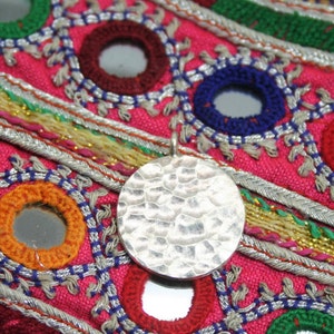Hand hammered round pendent