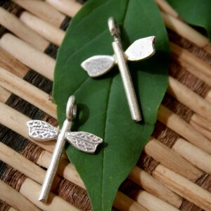 Silver dragonfly charm