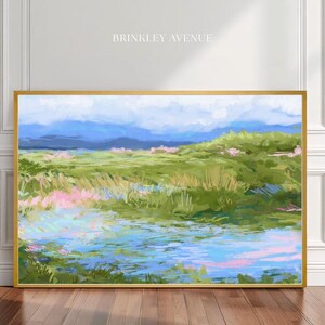 Contemporary low country marsh abstract canvas print featuring southern wetland landscape with soft blue sky, green marsh grasses, reflective water, coastal Grandmillennial home decor wall art in gold frame