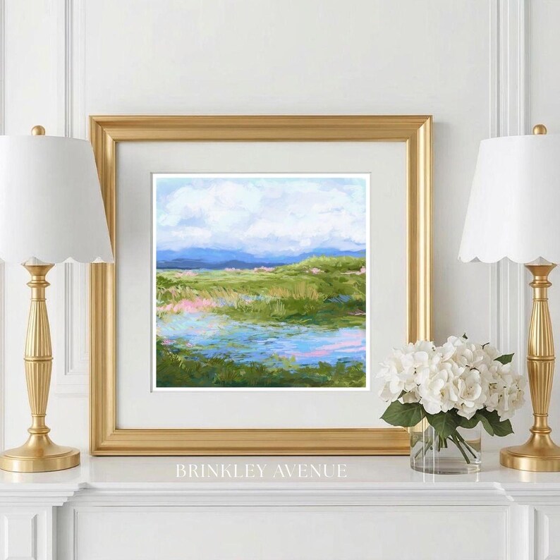 Contemporary low country marsh abstract canvas print featuring southern wetland landscape with soft blue sky, green marsh grasses, reflective water, coastal Grandmillennial home decor wall art in gold frame