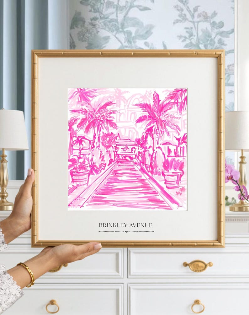 Hand-drawn pink coastal artwork depicting a Palm Beach–style walkway lined with palm trees, tropical foliage, and resort architecture; preppy, vibrant, tropical illustration with a summery coastal aesthetic