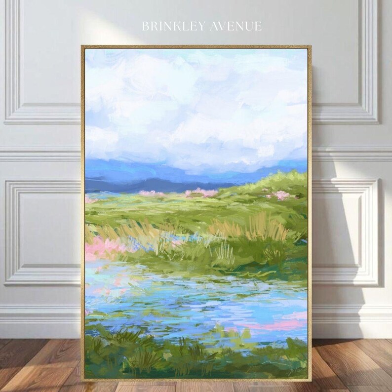 Contemporary low country marsh abstract canvas print featuring southern wetland landscape with soft blue sky, green marsh grasses, reflective water, coastal Grandmillennial home decor wall art in gold frame