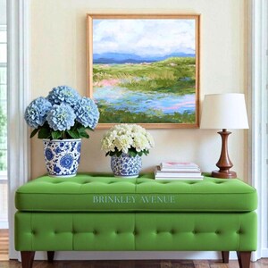 Contemporary low country marsh abstract canvas print featuring southern wetland landscape with soft blue sky, green marsh grasses, reflective water, coastal Grandmillennial home decor wall art in wooden frame
