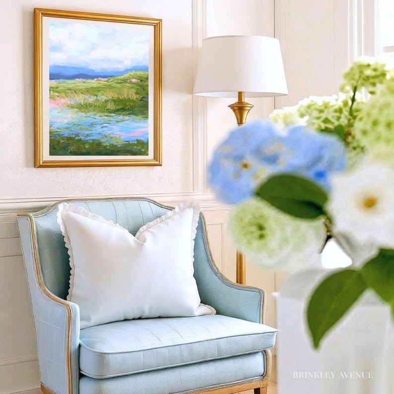 Contemporary low country marsh abstract canvas print featuring southern wetland landscape with soft blue sky, green marsh grasses, reflective water, coastal Grandmillennial home decor wall art in gold frame