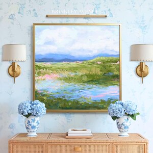 Contemporary low country marsh abstract canvas print featuring southern wetland landscape with soft blue sky, green marsh grasses, reflective water, coastal Grandmillennial home decor wall art in gold frame
