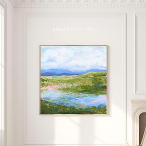 Contemporary low country marsh abstract canvas print featuring southern wetland landscape with soft blue sky, green marsh grasses, reflective water, coastal Grandmillennial home decor wall art in wood frame