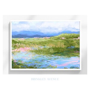 Contemporary low country marsh abstract canvas print featuring southern wetland landscape with soft blue sky, green marsh grasses, reflective water, coastal Grandmillennial home decor wall art in white frame