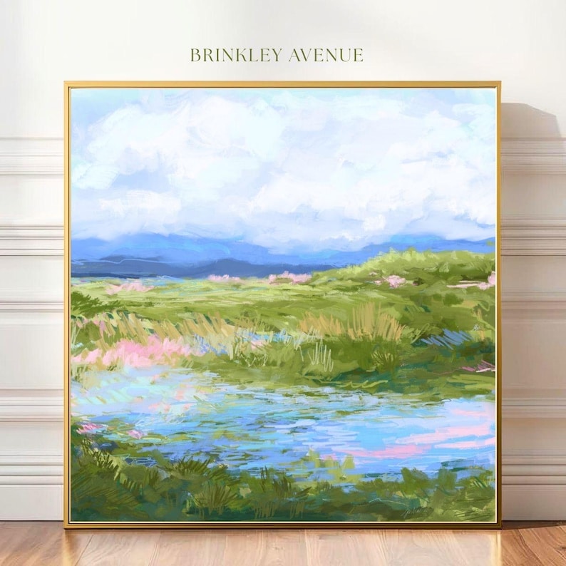 Contemporary low country marsh abstract canvas print featuring southern wetland landscape with soft blue sky, green marsh grasses, reflective water, coastal Grandmillennial home decor wall art in gold frame