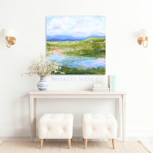 Contemporary low country marsh abstract canvas print featuring southern wetland landscape with soft blue sky, green marsh grasses, reflective water, coastal Grandmillennial home decor wall art in gold frame