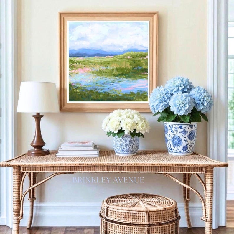 Contemporary low country marsh abstract canvas print featuring southern wetland landscape with soft blue sky, green marsh grasses, reflective water, coastal Grandmillennial home decor wall art in gold frame