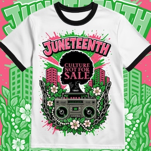 May include: A white t-shirt with a black ringer neck features a graphic design of a black silhouette of a woman's head with the text "Juneteenth", "Culture Not For Sale", and "1865". The graphic is surrounded by green and pink paint splatters and flowers.