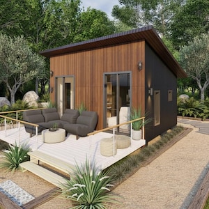 May include: A modern, single-story home with a brown wood facade and a black side. The home features a deck with a gray sofa, a small round table, and potted plants. The house is surrounded by trees and landscaping.
