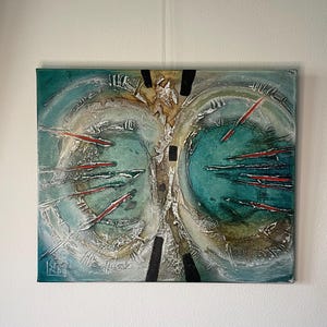 May include: Abstract painting on canvas with a textured surface. The painting features a central, light brown shape with a black square in the middle. The shape is surrounded by two large, circular shapes, one in teal and one in white. The teal shape has red lines radiating from it. The white shape has a textured, white surface with a light brown outline.