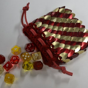 Scale Dice Bag in knitted Dragonhide Armor in Red and Gold Stripes