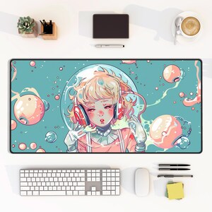 May include: A blue and pink anime-style illustration of a girl with blonde hair wearing headphones and a pink dress. The girl is surrounded by bubbles and appears to be floating in space.