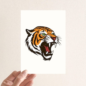 May include: A close-up of a roaring tiger's head with orange and black stripes, green eyes, and a white background.
